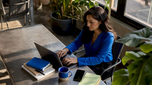 Woman working on marketing tools in home office
